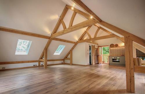 Warwickshire oak trusses in room above garage